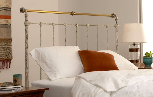 Iron & Brass queen bed close-up in Vintage White