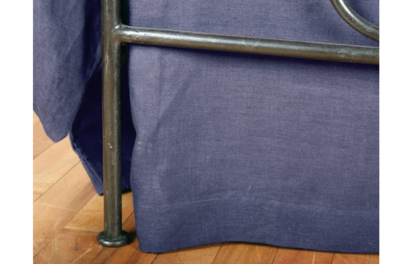 Breton trundle bed forged iron footboard detail