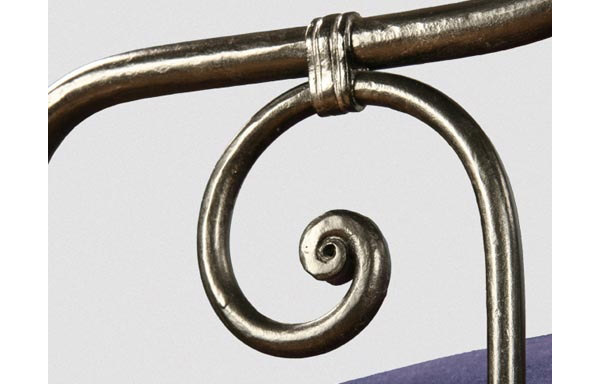 Breton trundle bed forged iron scroll detail