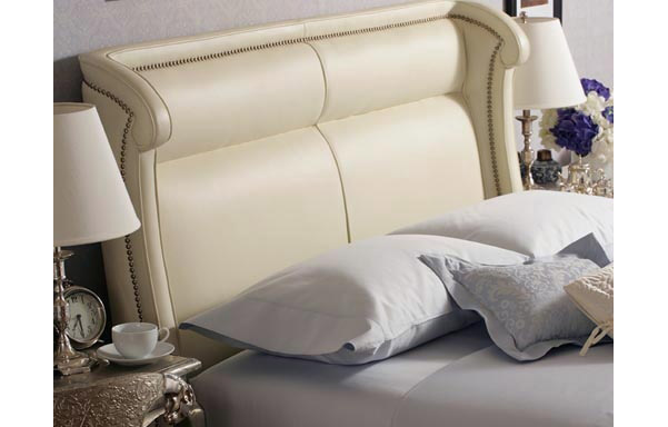 Wing white leather bed headboard detail
