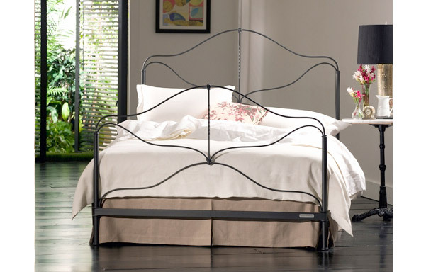 Provence iron bed traditional room setting
