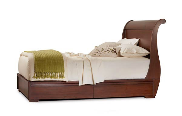 Sleigh platform bed with drawers closed
