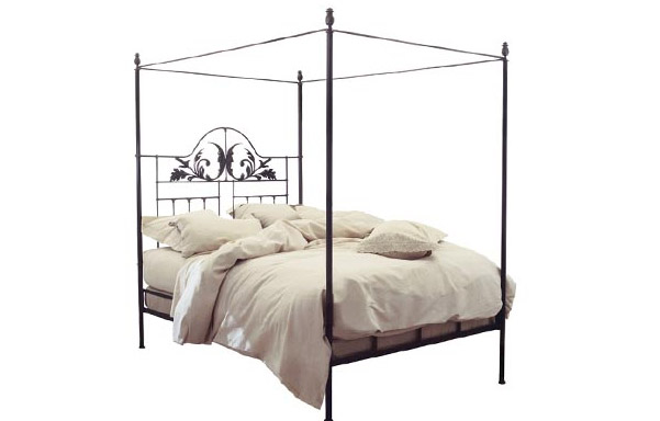 Iron Harvest Moon canopy bed with gilded highlights
